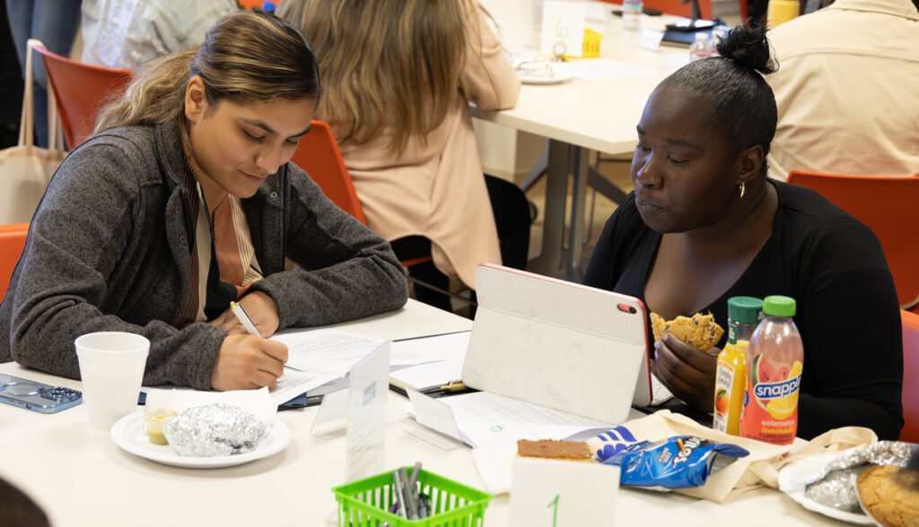 two women working on paperwork